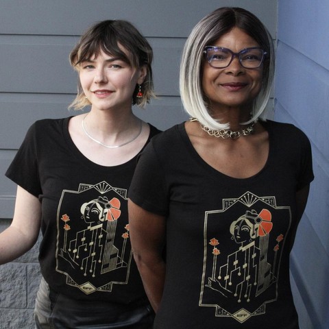 Two people wearing EFF's black scoop neck t-shirt